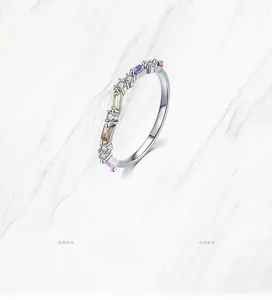 Macro detail of S925 sterling silver ring featuring colorful baguette-cut gemstones