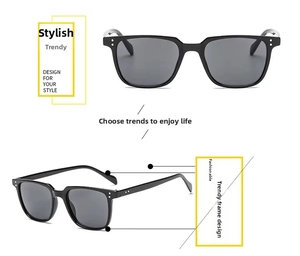 Detail view of black square sunglasses featuring silver double rivets and dark lenses