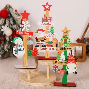 Three-piece Christmas wooden tabletop ornaments featuring Santa, Snowman, and Gnomes