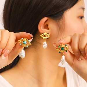 Vintage evil eye earrings with baroque pearls and tiger eye stones in gold plating