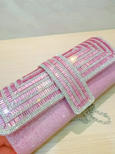 Elegant pink rhinestone evening clutch bag with sparkling crystals and silver chain strap