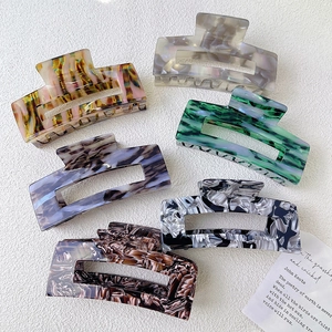 Set of six large acetate rectangular hair claws with elegant marble and tortoiseshell patterns