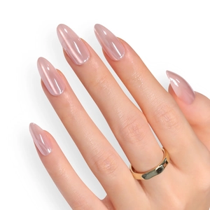 Cat eye almond press-on nails in pearl nude pink with a high-gloss finish and gold ring