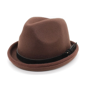 Detailed texture of dark brown wool fedora hat with black leather band and metal buckle
