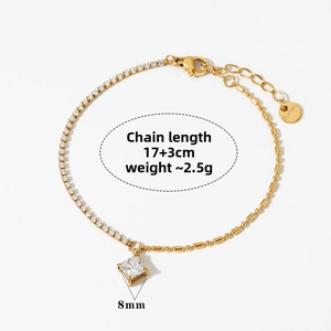 Detail of gold spliced bracelet featuring a 8mm square zircon and mixed bead chain links