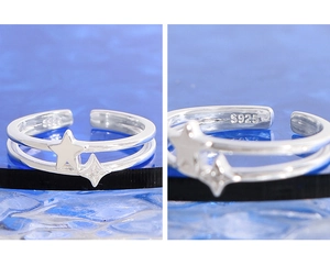 Macro shot of S925 sterling silver stamp and double star details on an open ring