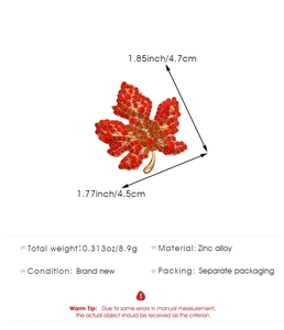 Detailed size chart for maple leaf brooch with dimensions 4.7cm by 4.5cm and zinc alloy material