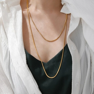 Minimalist double-layered gold snake bone chain necklace in titanium steel for women