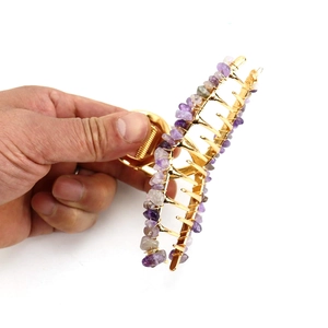 Golden hair claw clip with handmade purple amethyst chips and secure metal teeth