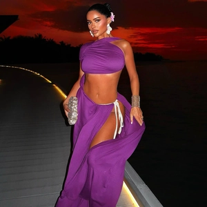Detail of purple cutout crop top and side-split maxi dress for summer beach vacation