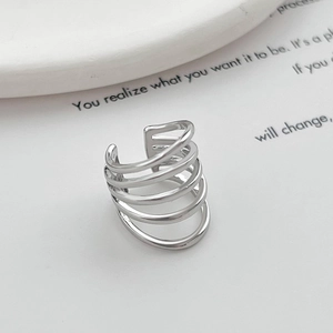 Detailed view of silver layered U-shape ear cuff with minimalist five-tier spiral design