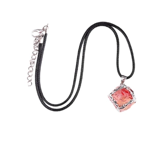 Polished faux crystal square pendant in red orange hue on a black braided cord necklace