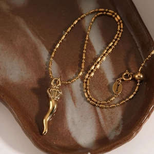 Adjustable stainless steel bead chain necklace featuring a gold crown cornicello pendant