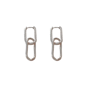 Silver interlocking oval chain link earrings with minimalist design on white background