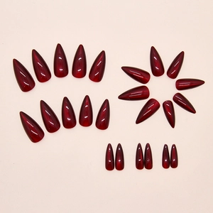 Elegant burgundy cat eye stiletto press-on nails set with magnetic shimmer finish