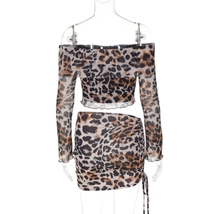Detail of leopard print crop top and drawstring skirt with fine fabric texture