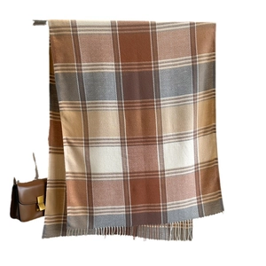 Classic thick plaid scarf in earth tones with tassels for autumn and winter warmth