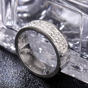 Elegant 8mm Shamballa 316L titanium steel ring with rows of sparkling crystals on black surface