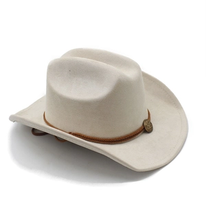 Close-up of cream faux suede cowboy hat with brown braided cord and vintage metal buckle