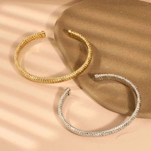 Französischer gedrehter Armreif in Gold und Silber Optik für Damen im Duo Set