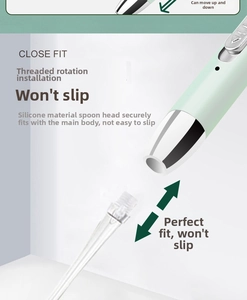 Detail of light green earwax removal tool with threaded screw-on silicone spoon head