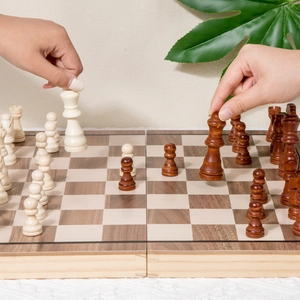 Premium wooden magnetic chess set with foldable board and two extra queens for strategy play