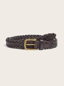 Detail of dark brown braided belt featuring a vintage gold square buckle on beige background