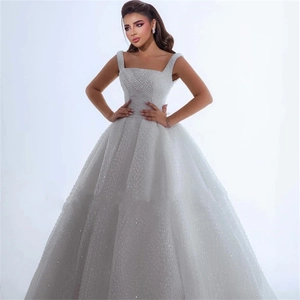 Elegant white sequined wedding dress with square neck and intricate beadwork embroidery