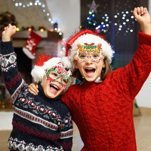 Festive Christmas party glasses set featuring Santa and Gingerbread Man for kids