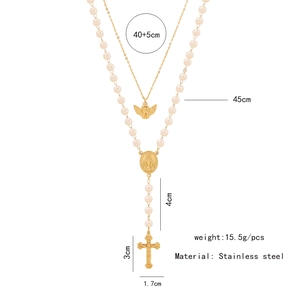 Detailed size chart of gold stainless steel necklace with angel and cross pendants