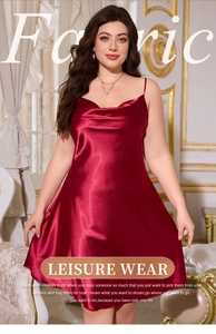 Detail of burgundy silk nightgown featuring elegant cowl neck and adjustable straps