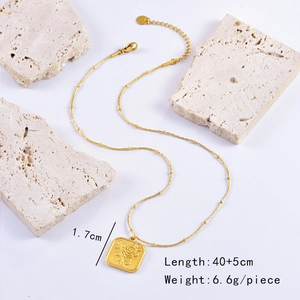 Detail view of golden square rose pendant necklace with size 1.7cm and length 40+5cm