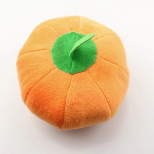 Giocattolo di peluche sonoro per cani a forma di zucca con stelo verde e morbido