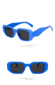 Front and side view of irregular square blue sunglasses with dark grey lenses