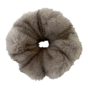Plush faux mink fur scrunchie in taupe grey for elegant winter hairstyles