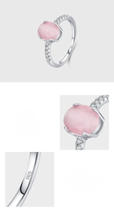Detail of S925 sterling silver stamp and pink cat eye stone setting on luxury ring
