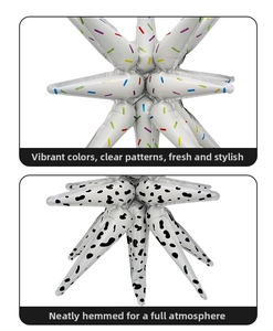 Détail de ballons en étoile avec motifs de confettis colorés et imprimé vache