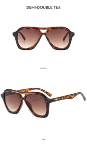 Front and side view of vintage tortoise shell pilot sunglasses with gradient lenses