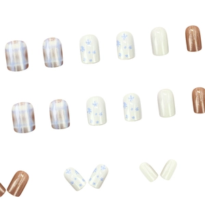 Short square press-on nails featuring vintage blue plaid and floral patterns