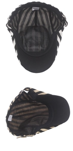 Close-up of internal 100% cotton wash label and breathable striped lining on the beret hat