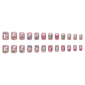 Press-on nails with pink base and colorful heart designs in a 24-piece full set display