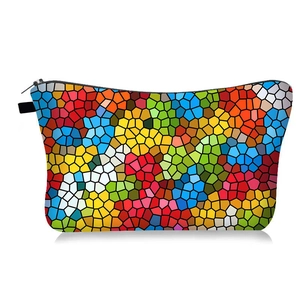Colorful hexagonal makeup bag with vibrant mosaic geometric patterns and black zipper closure