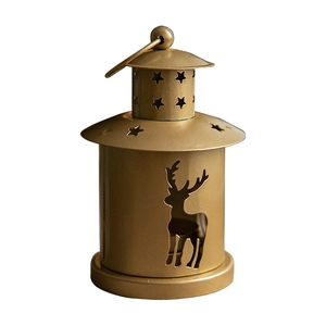 Matte gold Christmas lantern with reindeer silhouette and star cutouts on white background
