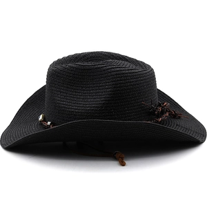 Detail of black woven cowboy straw hat featuring a brown band with turquoise accents
