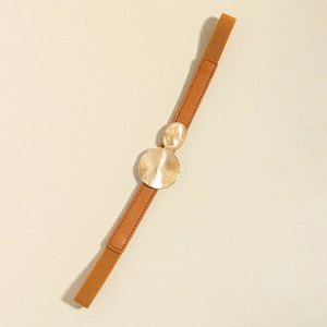 Detail of tan elastic belt with golden overlapping sunburst texture circle buckles