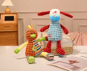 Detail of vibrant plush animal toys featuring unique textured fabrics and striped patterns