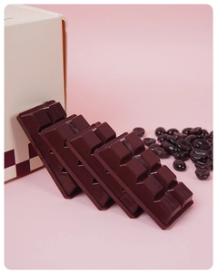 Detailed view of realistic PVC chocolate charms with elegant gift box and coffee beans