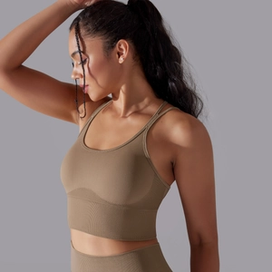 Detail of khaki seamless ribbed sports bra and high-waist yoga pants set texture