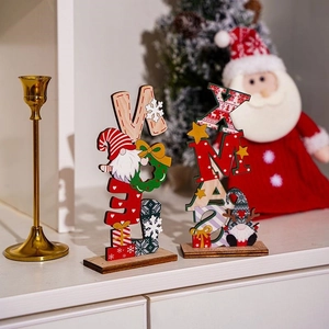 Nordic wooden Christmas gnome table decor with NOEL and XMAS lettering and painted finish