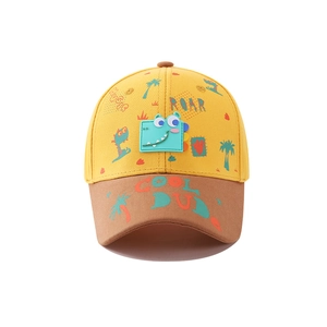 Kids baseball cap in yellow and brown featuring cartoon dinosaur prints and text